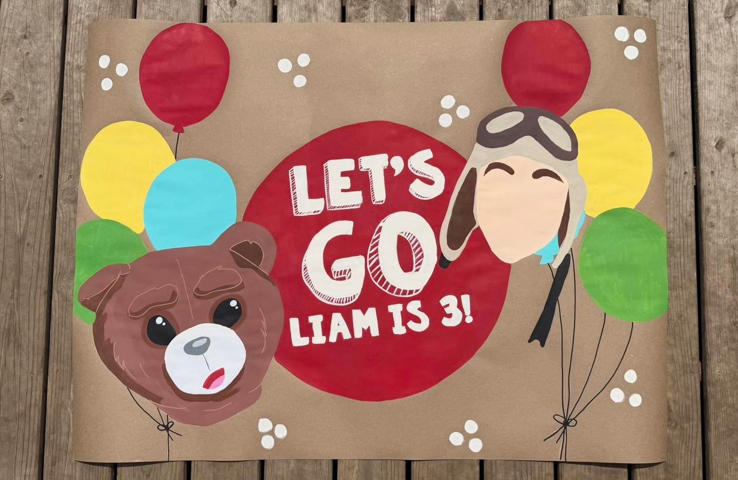 Hand-painted birthday banner by Banner Barn