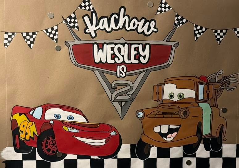 Hand-painted birthday banner by Banner Barn