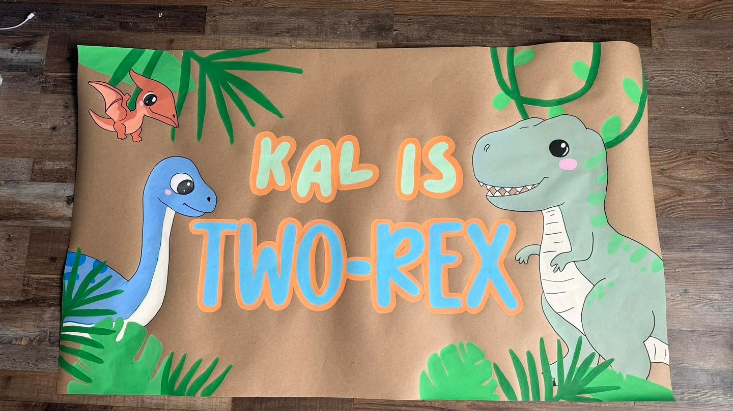 Hand-painted birthday banner by Banner Barn