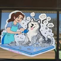 Hand-painted seasonal window art by Banner Barn