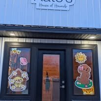 Hand-painted seasonal window art by Banner Barn